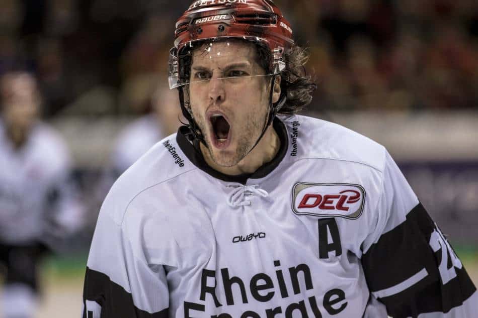 Hockey player shouting.