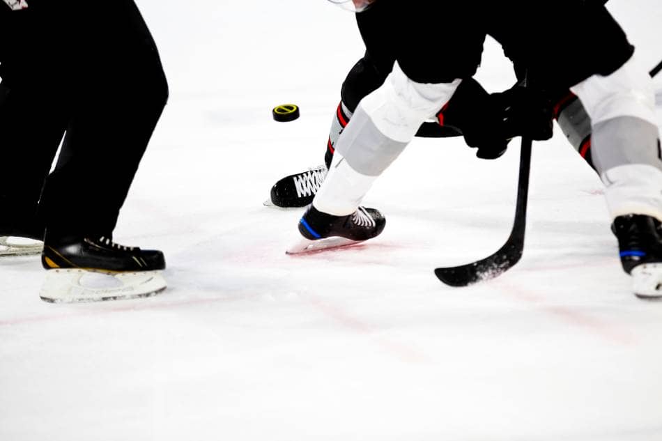 How Much Do Hockey Pucks Weigh? [And The Reasoning Why] - Coaching Kidz