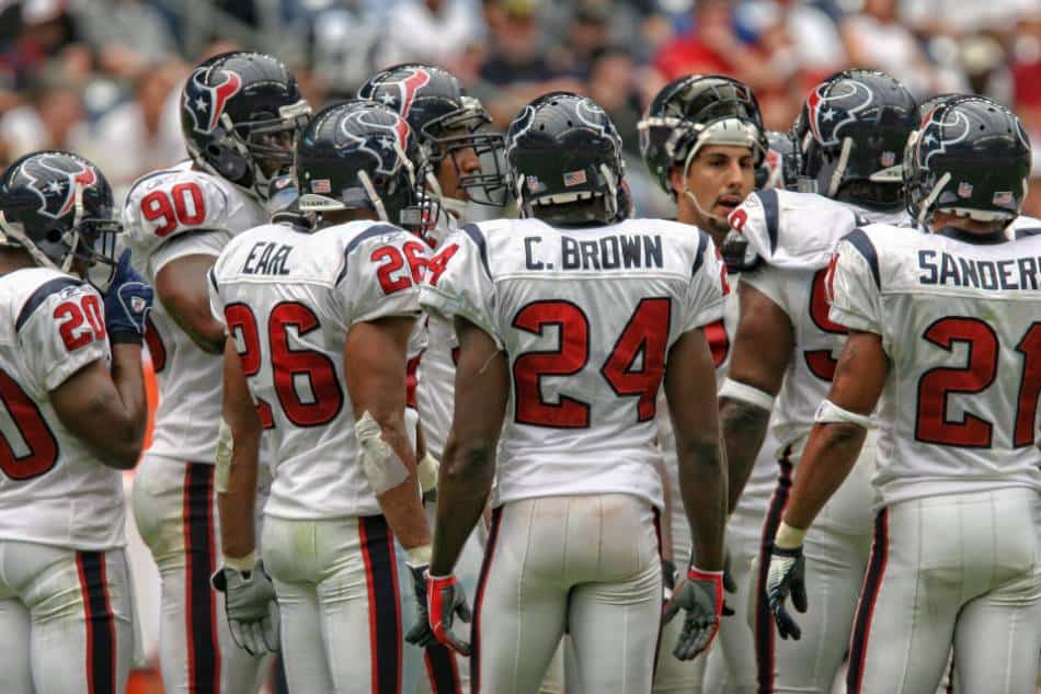 Houston Texans huddle around for the next play.