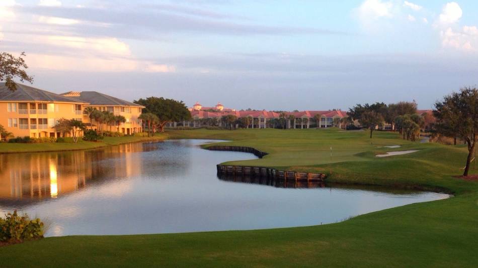 A golf course at sunset.