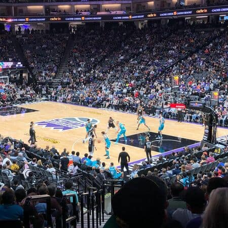 A Sacramento Kings player starts to drive to the rim.