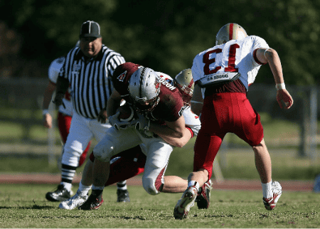 A edge rusher tackling the quarterback.