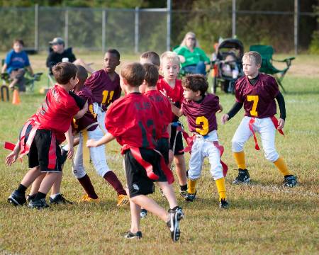 Kids playing flag football.