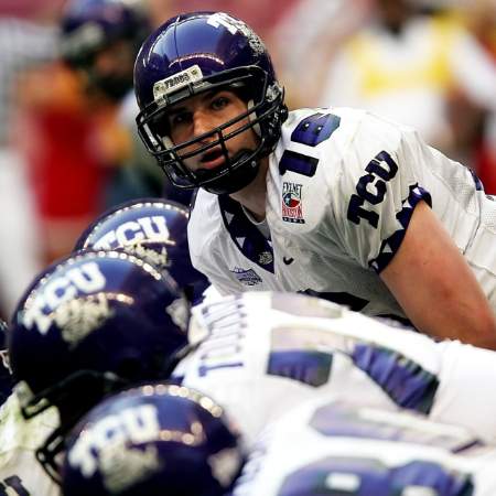 The TCU quarterback looks to his left before the ball is snapped.